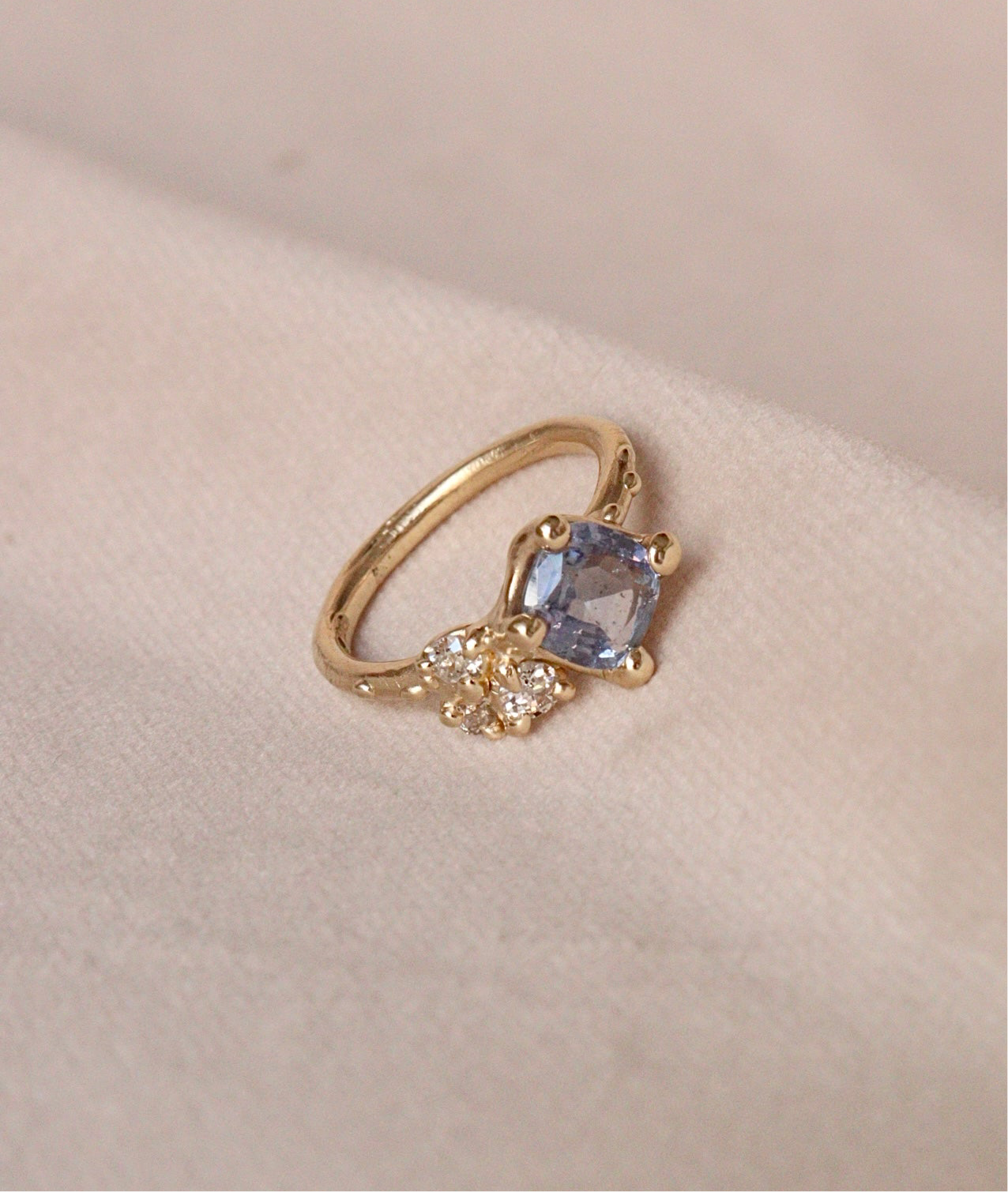 Denim blue sapphire engagement ring