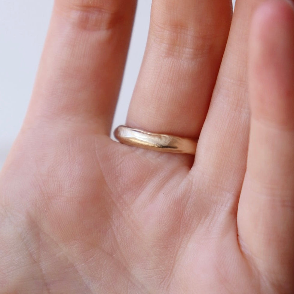 Deep Blue Sapphire on a Molten Gold Band