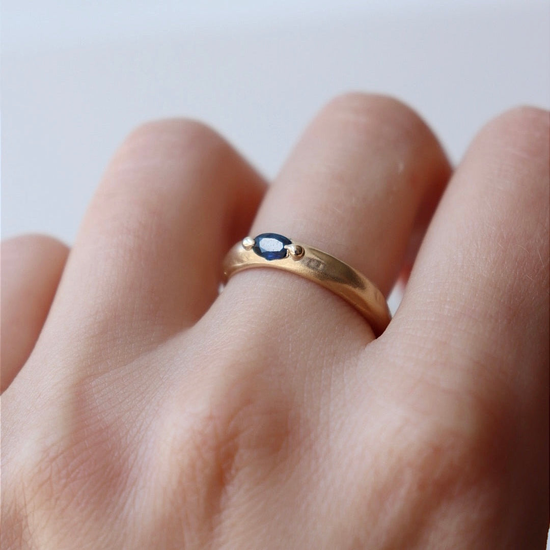 Deep Blue Sapphire on a Molten Gold Band