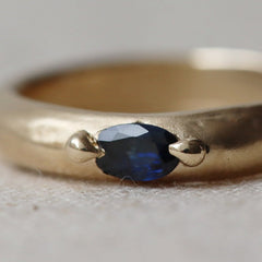 Deep Blue Sapphire on a Molten Gold Band