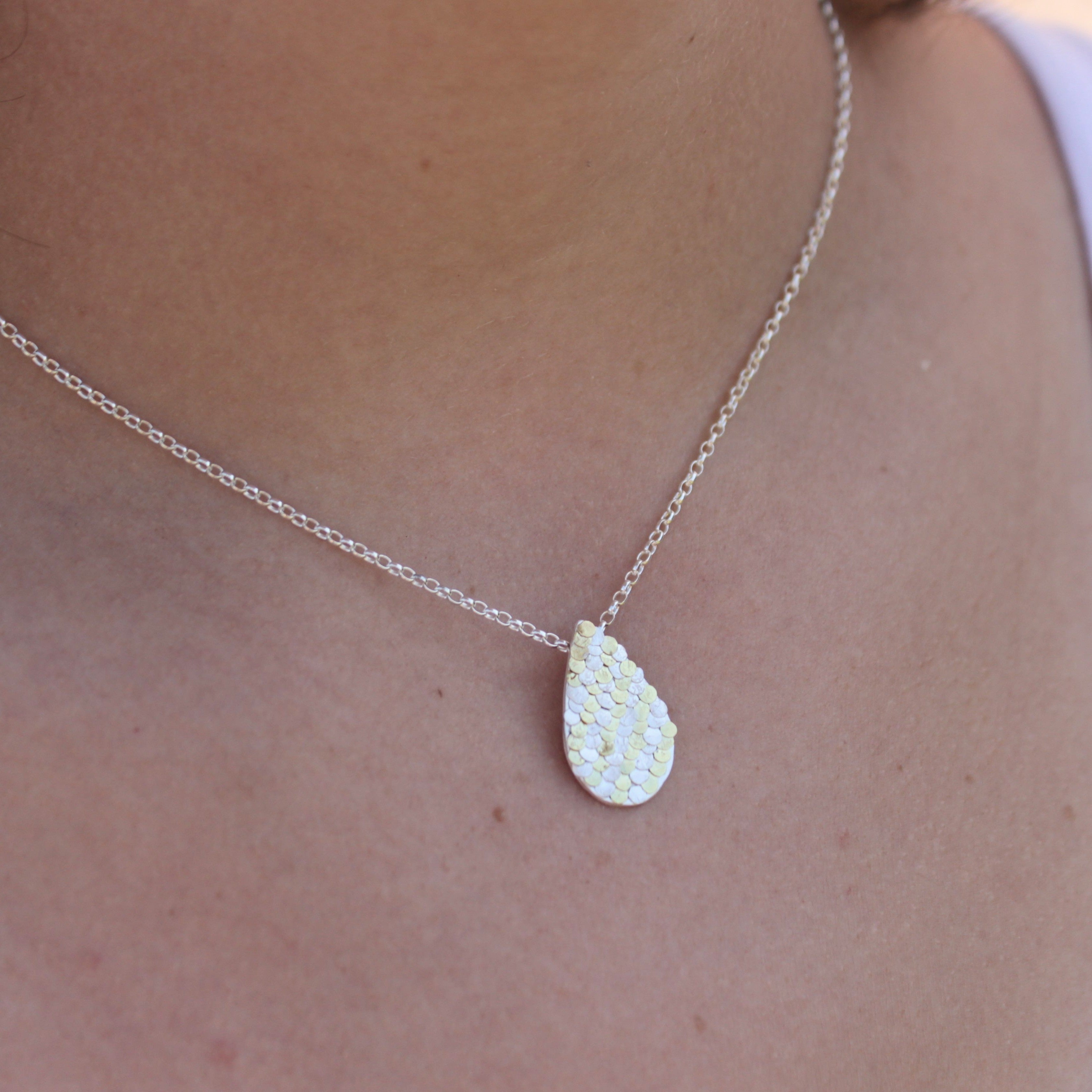 Silver and Gold Siren Pendant with Hidden Sapphire