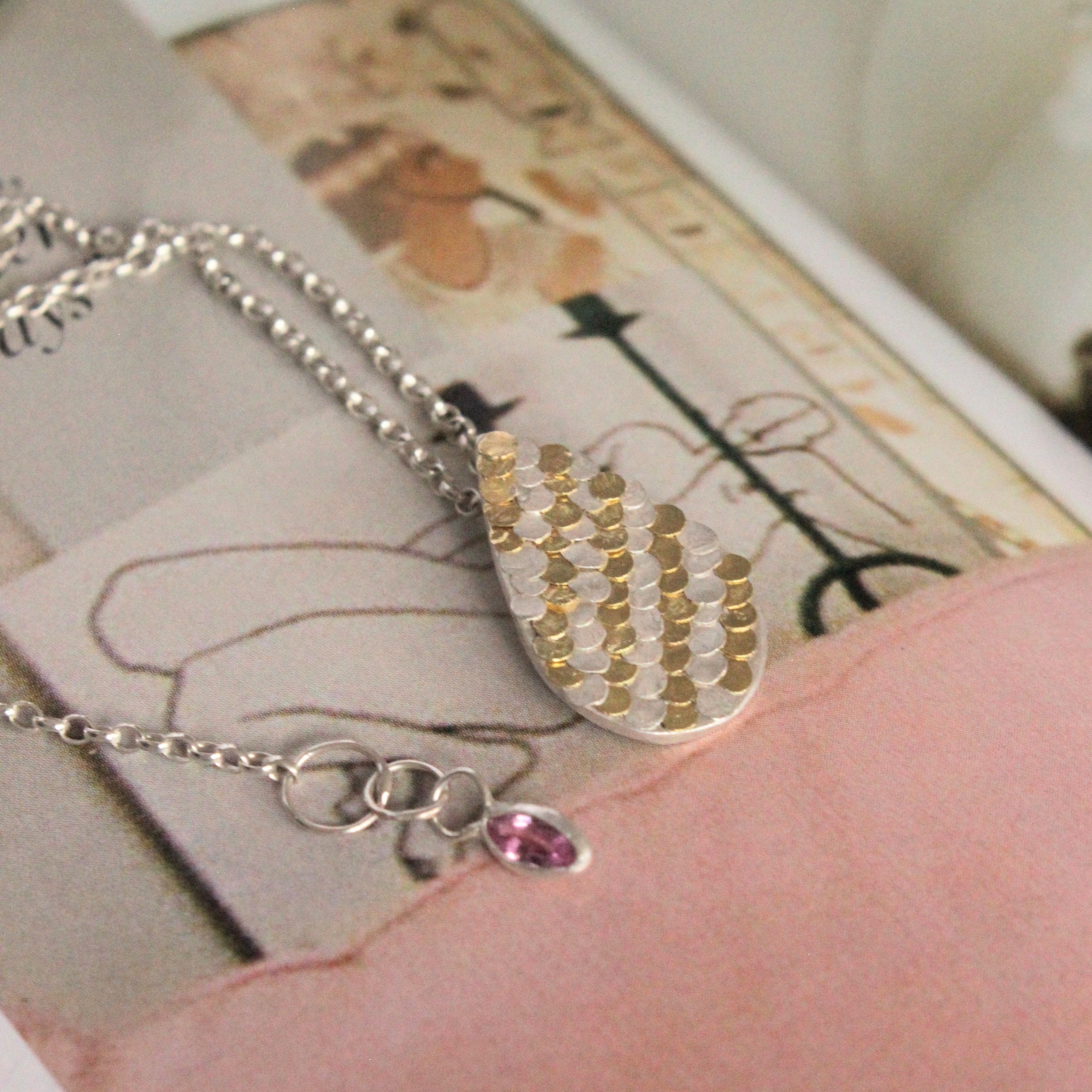 Silver and Gold Siren Pendant with Hidden Sapphire