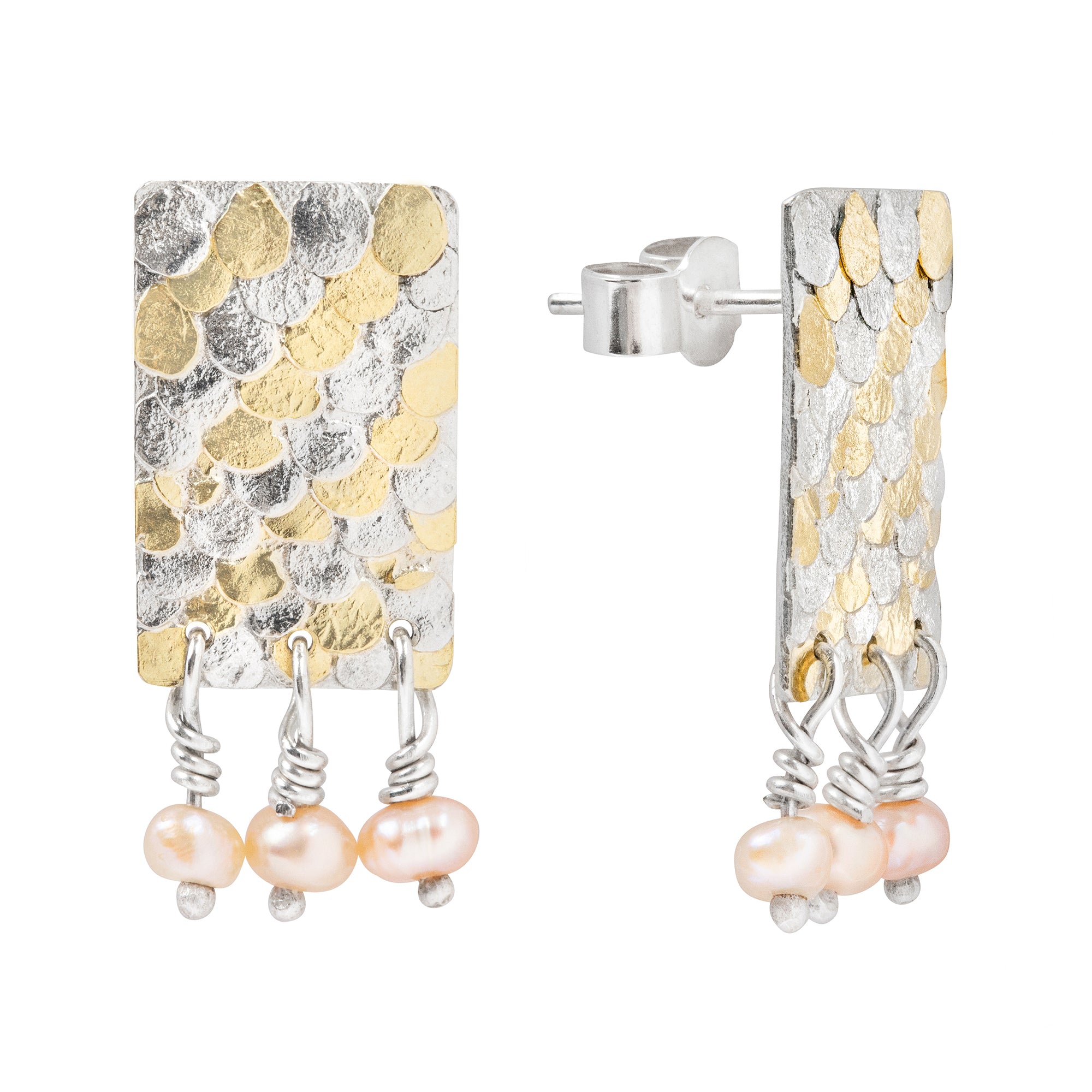 The Siren studs have been mindfully designed by Bournemouth based, Josie Mitchell jewellery, to be lightweight with luxurious, delicate details. Hand forged silver and 18ct gold scales are layered up to create a wonderful mermaid texture along with delicate pink fresh water pearls for a timeless and special pair of earrings.